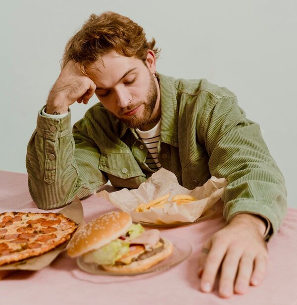 How to Stop Overeating Thumbnail (Upset Man)