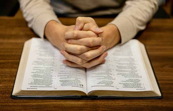 person reading about Jesus in Scripture