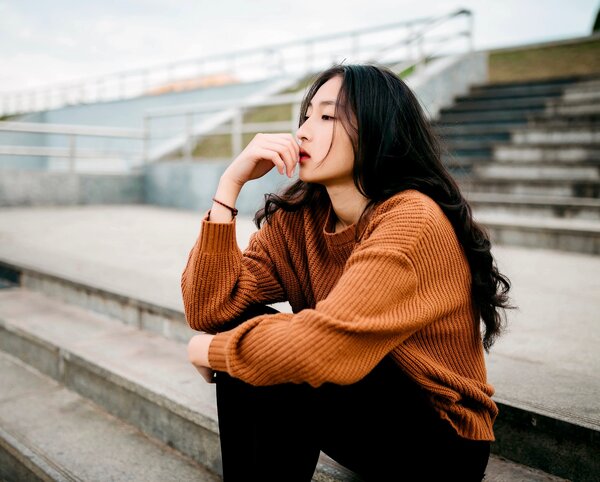 women waiting with uncertainty