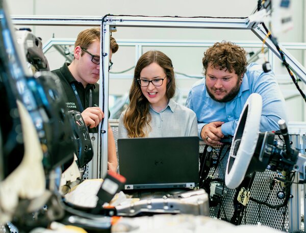 Engineers working together instead of being isolated by arrogance