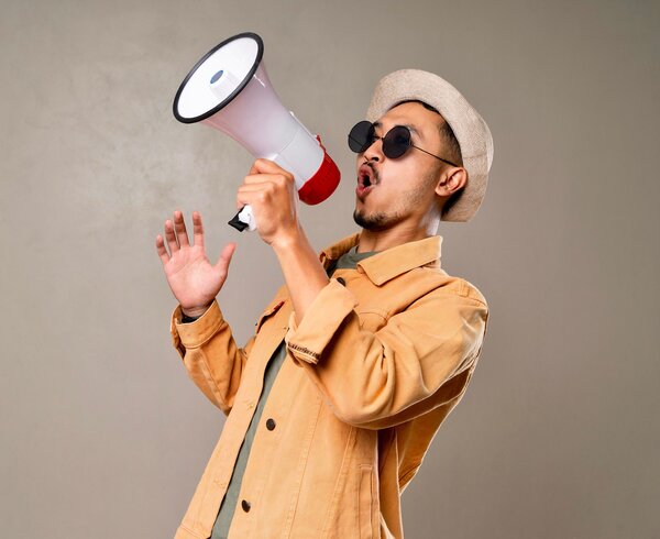 Man proclaiming justified opinion with megaphone