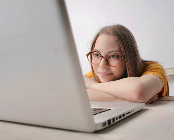 Woman reading an essay that matters online