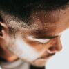 Man sweating after learning how to work hard on the grind