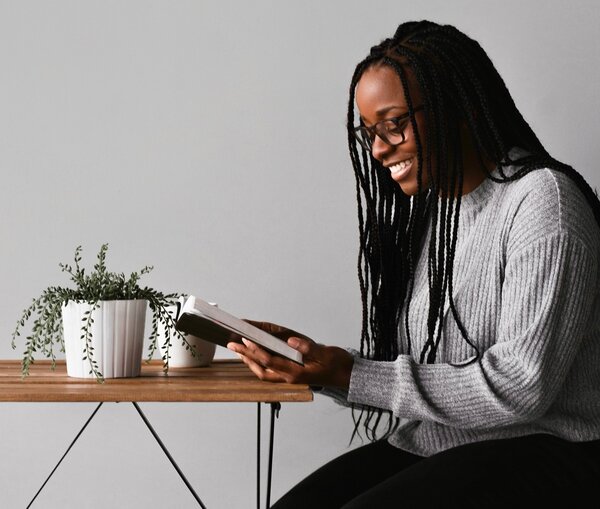 Single Christian woman reading Bible and investing in spiritual growth