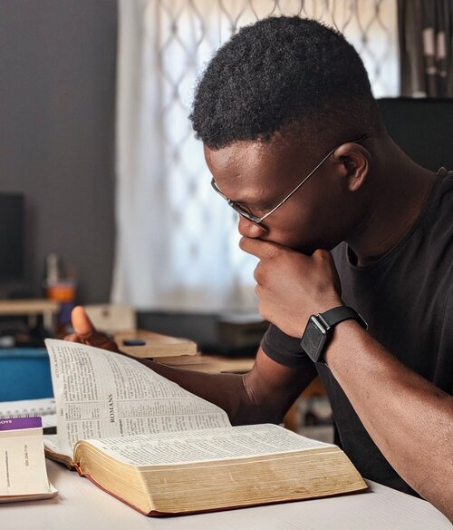 Young man studying the Bible for spiritual growth